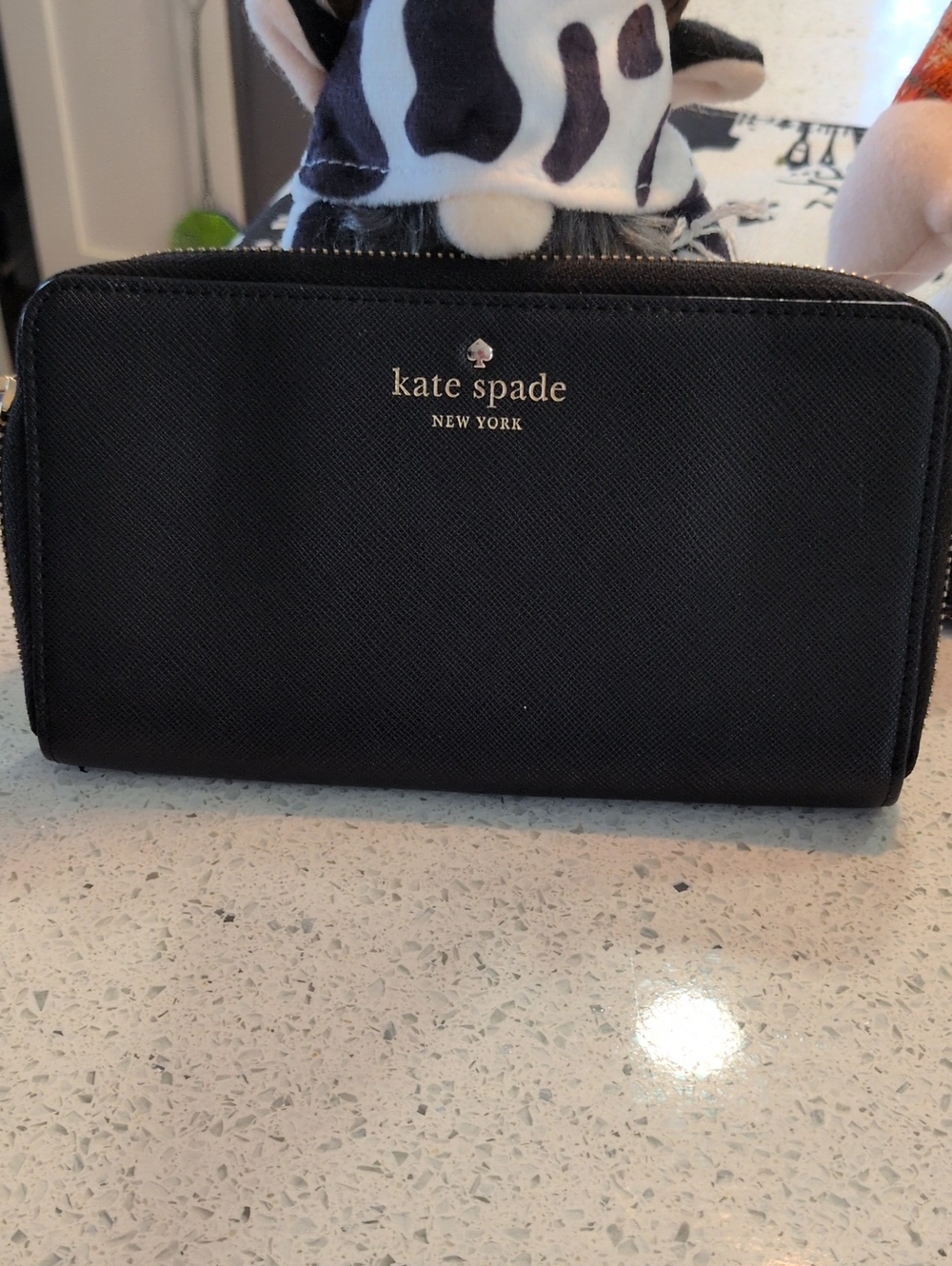 KATE SPADE black zip-around Saffiano wallet with gold logo No Callouts